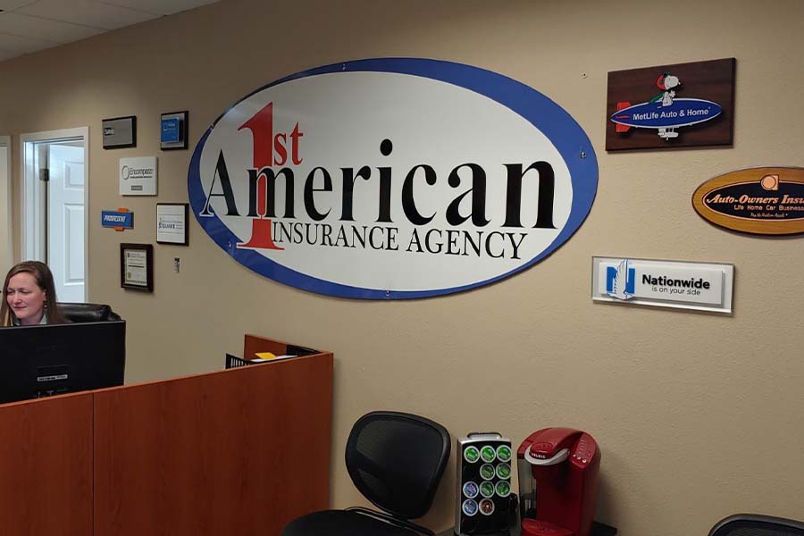 About Our Agency - Closeup of Main Office Lobby Area of 1st American Insurance Agency Sign