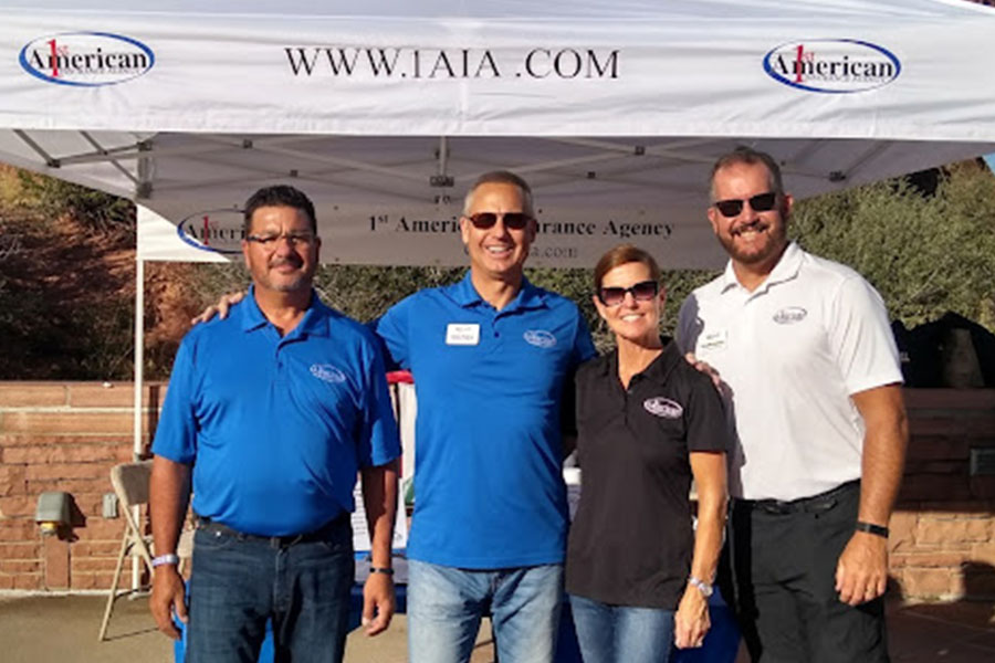 About Our Agency - Portrait of Select 1st American Insurance Agency Team Members Outdoors at an Event